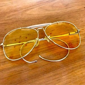 Vintage 1970s Bushnell aviator sunglasses yellow shooting lens 45mm mid size